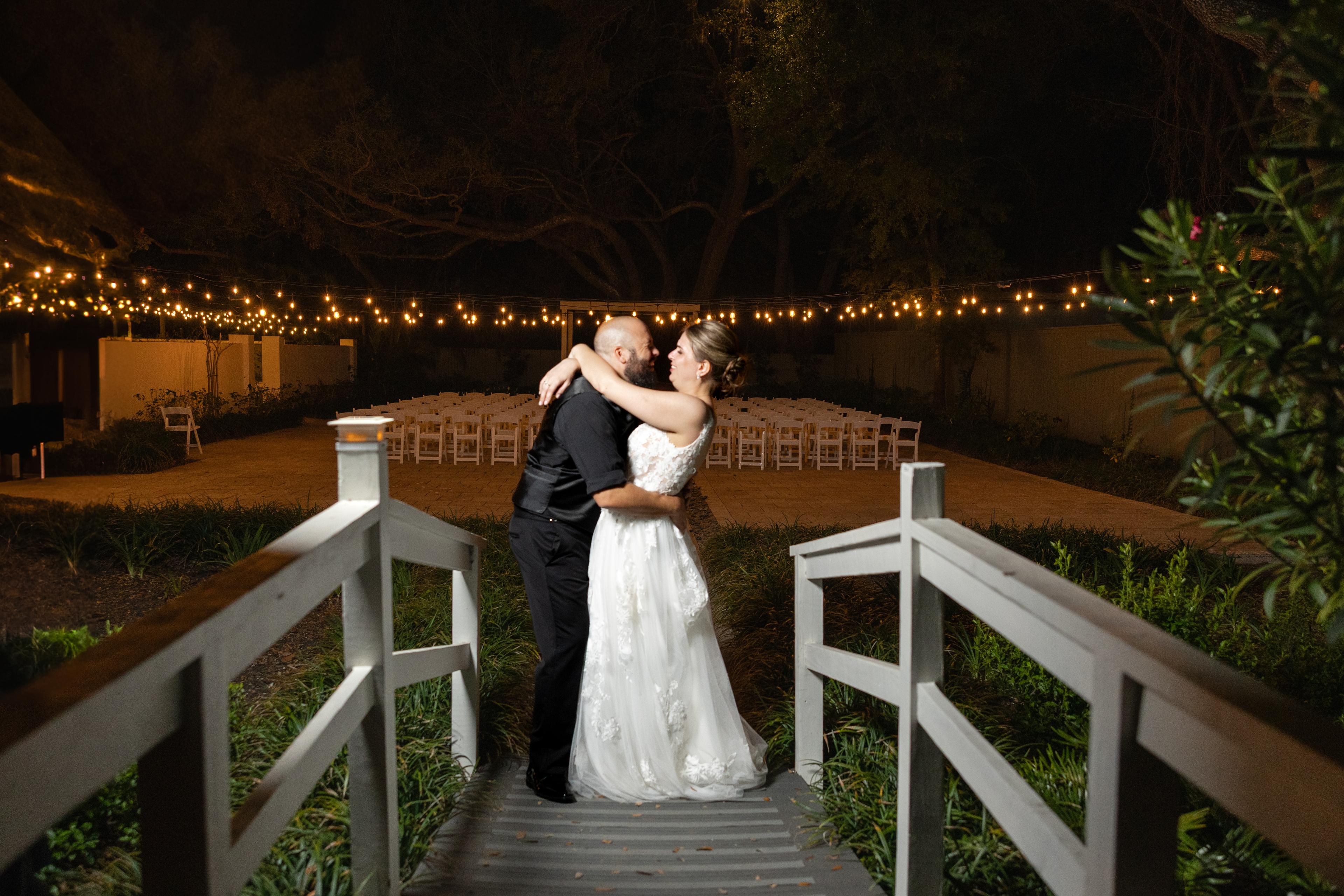 Yes, you should take a break from dancing at your reception and take night photos with your wedding photographer. | Tampa Wedding Photographer