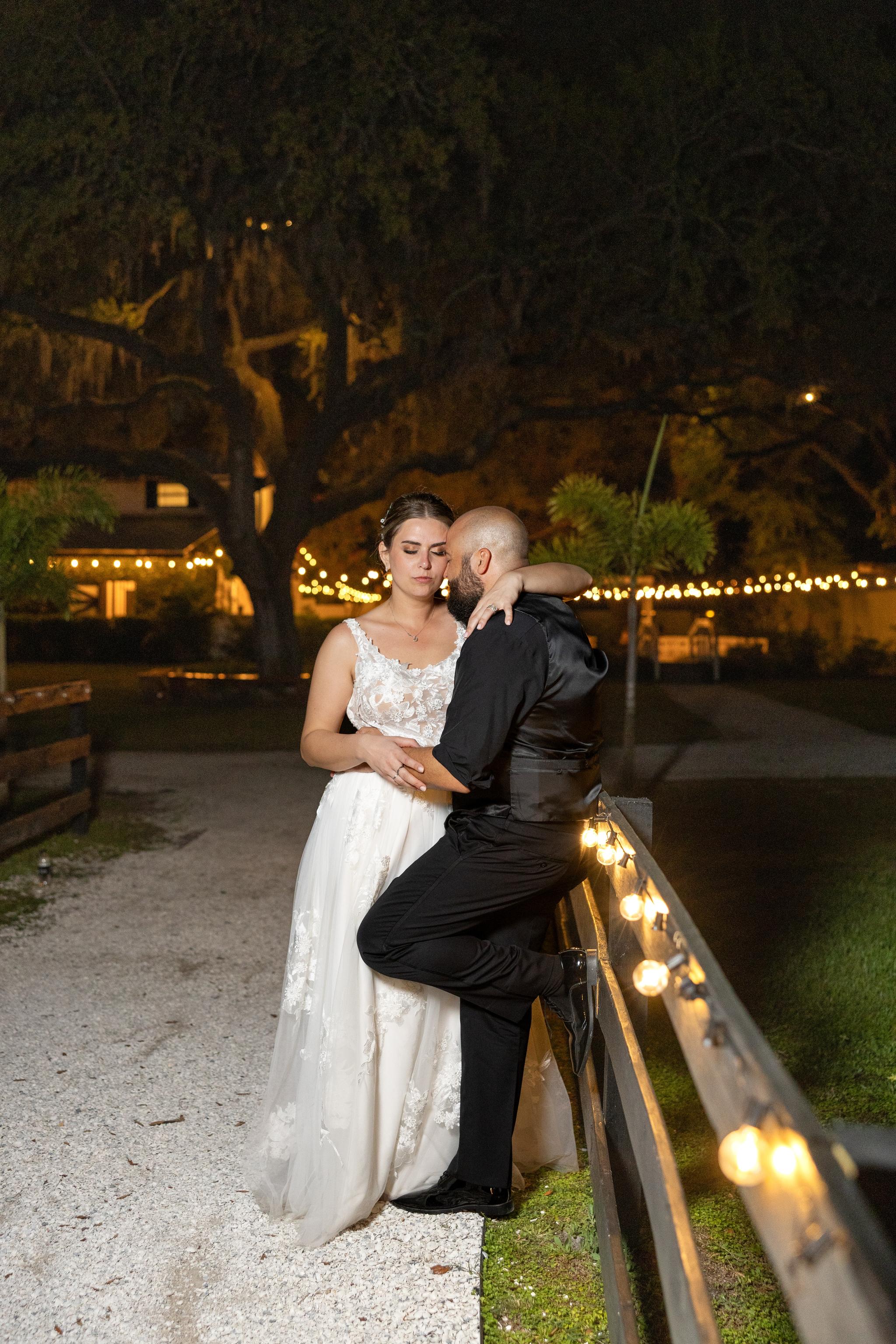 Yes, you should take a break from dancing at your reception and take night photos with your wedding photographer. | Tampa Wedding Photographer